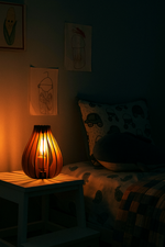 A cozy children's bed room with MDF table lamp on the side table.