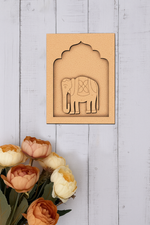 Raw MDF elephant wall hanging base with carved floral pattern for DIY painting.