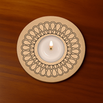 MDF Floral Loop Candle Holder with lit tealight on wooden table