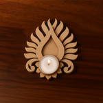 Intricately carved MDF Padmaja tealight holder in natural wood finish placed on wooden surface – empty diya holder slot visible