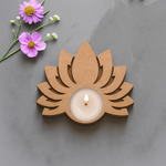 Wooden lotus tea light holder with lit tealight and floral accent