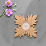 Flower-shaped MDF tealight holder with lit candle for home and festive décor