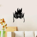 Black MDF wall art featuring a decorative masquerade mask design with intricate details, mounted on a neutral wall above a sofa with floral decor