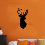 Silhoutte deer-shaped mdf wall art mounted on an orange wall, adding a modern and stylish touch to the home decor