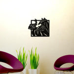 Black horse wall art featuring a detailed design of a galloping horse, mounted on a cream-colored wall above modern decor with green plants and purple chairs