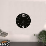 Stylish black wall clock with white "12" and "6" numerals, black hands, and a minimalist design, ideal for modern home decor or office interiors