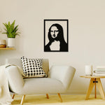 Modern minimalist Mona Lisa-inspired wall art in black silhouette displayed in a cozy living room.