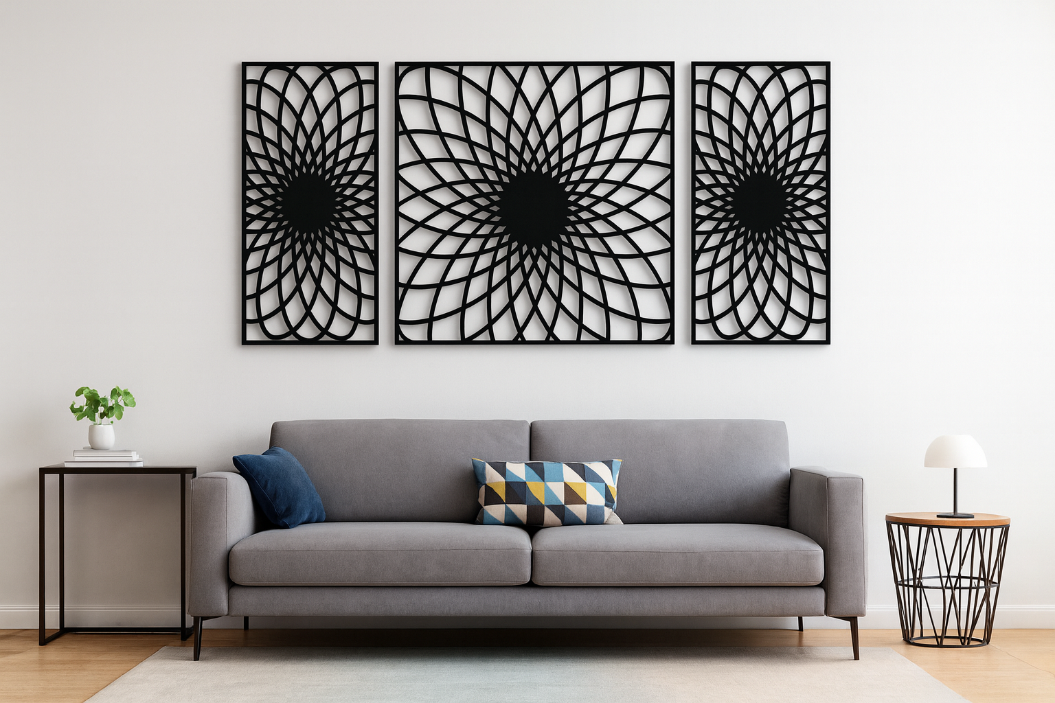 Modern black geometric metal wall art panels displayed above a grey sofa in a contemporary living room, creating an elegant and minimalist home decor look.