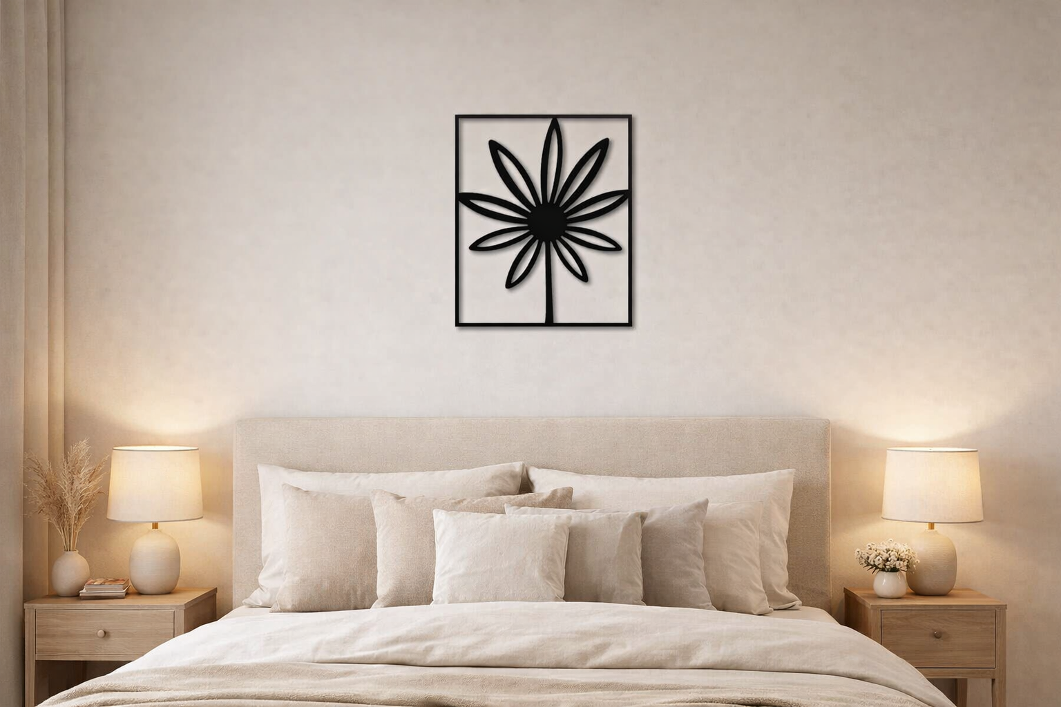 Modern black floral metal wall art displayed on a white wall above a minimalist console table, adding elegant and contemporary home decor style.