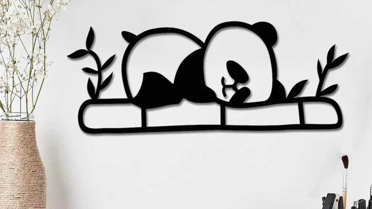 Panda-themed wall decor with bamboo design.
