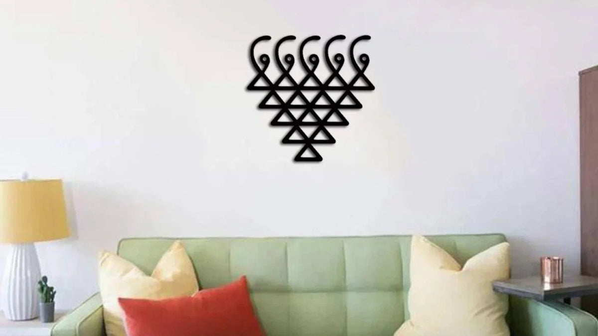 MDF geometric wall decor displayed above a modern green sofa in a stylish living room with soft cushions, lamp, and minimalist home décor.