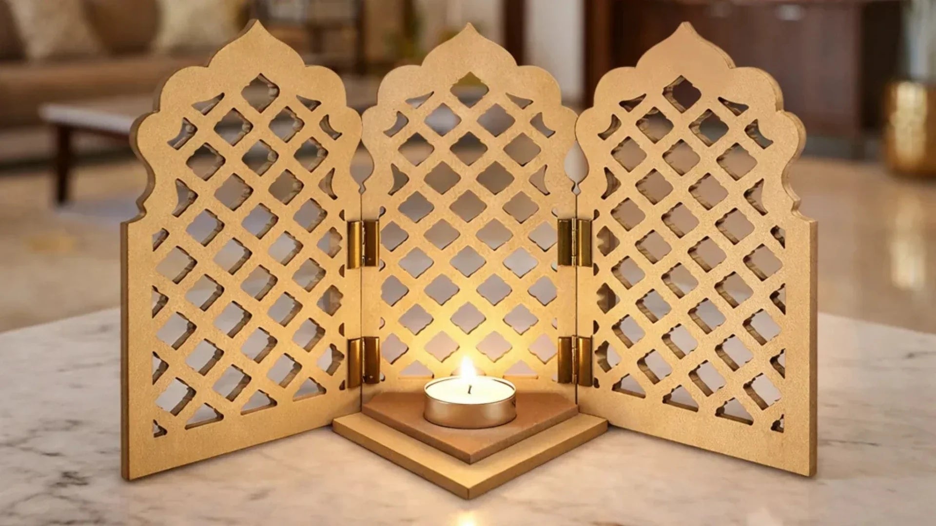 MDF tealight holder with three decorative lattice panels and a glowing candle, displayed on a marble surface in a warm home interior.