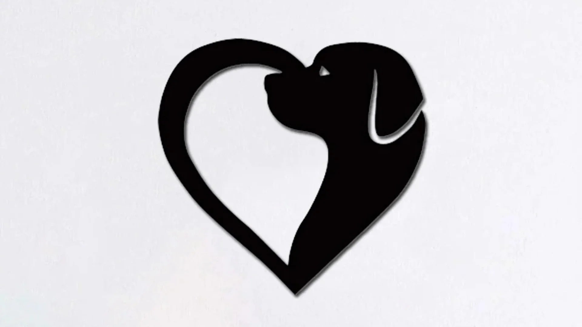 Black MDF dog silhouette wall art in a heart-shaped design, ideal for pet lovers, home decor, DIY painting, and craft projects.