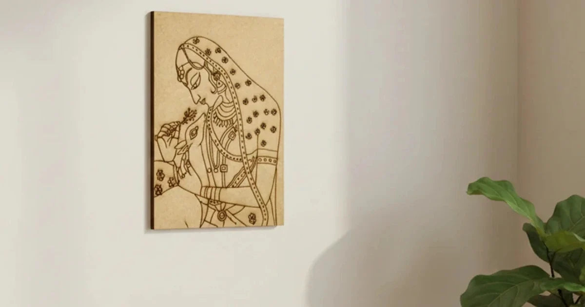 MDF board featuring an intricate engraved traditional Indian woman design, displayed as decorative wall art on a neutral-colored wall.