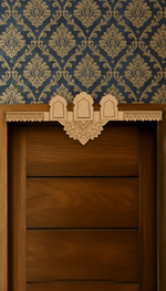 Three-arch mandala MDF toran with engraved centerpiece – displayed on wooden door