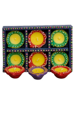 Colorful decorative candle diyas in box for Diwali and festive celebrations
