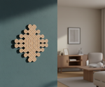 Decorative MDF DIY wall art on a teal wall with a blurred living room in the background