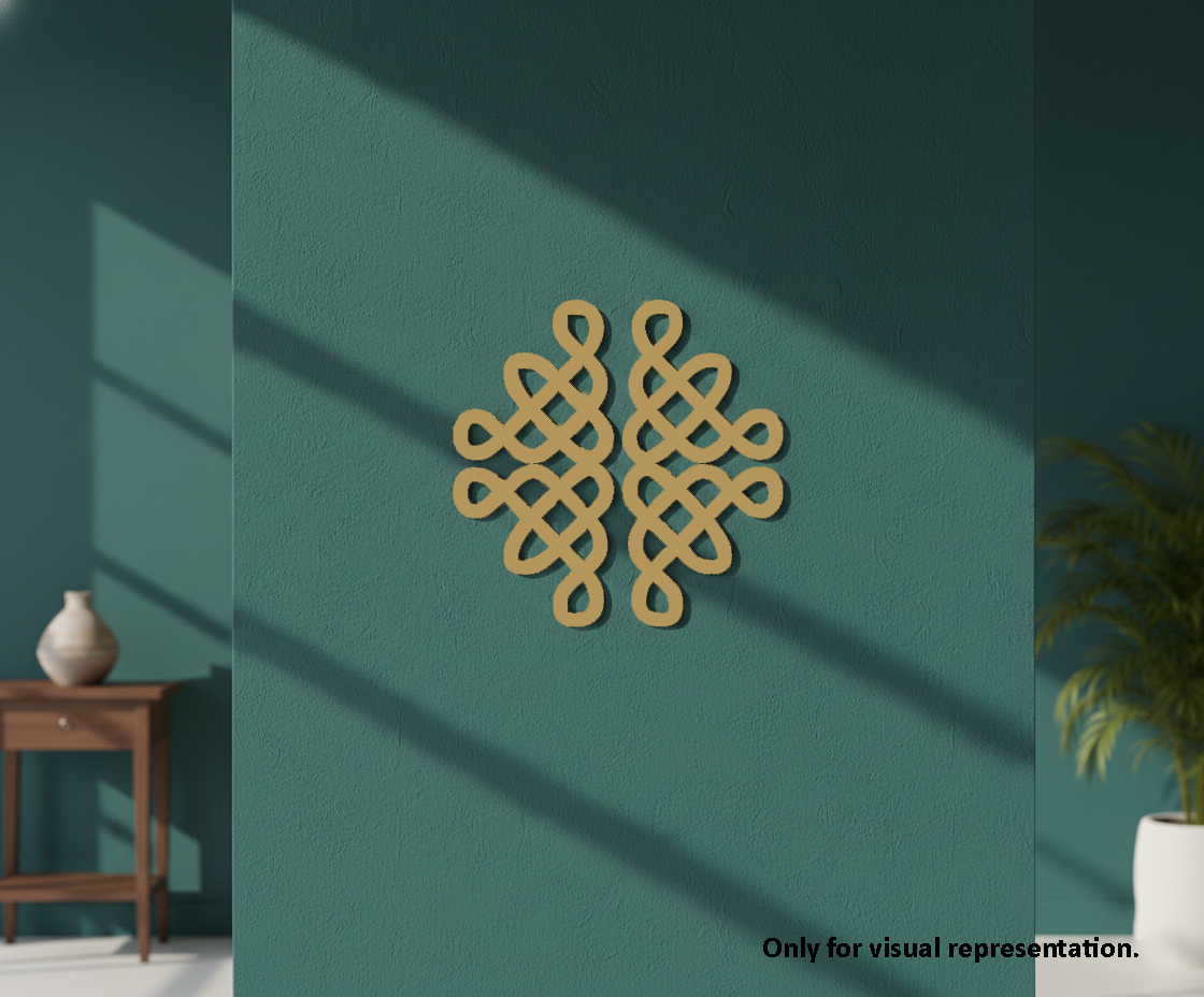 Decorative MDF DIY  wall piece on a teal wall with a wooden side table and plant.