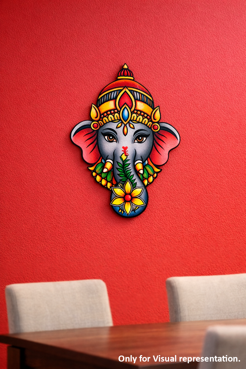 Decorative MDF DIY wall art of a colorful elephant head on a red wall with a table and chairs in the foreground.