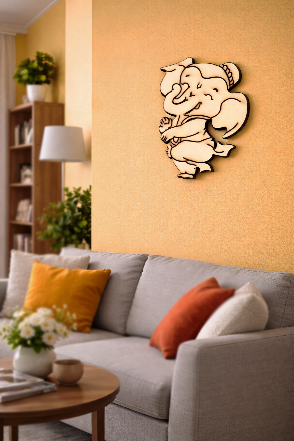 Decorative MDF DIY wall art of a cartoon character on an orange wall above a gray sofa with colorful cushions.
