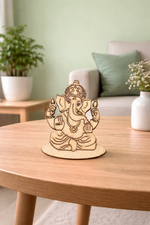 MDF DIY  Ganesha statue on a wooden table with a blurred indoor background