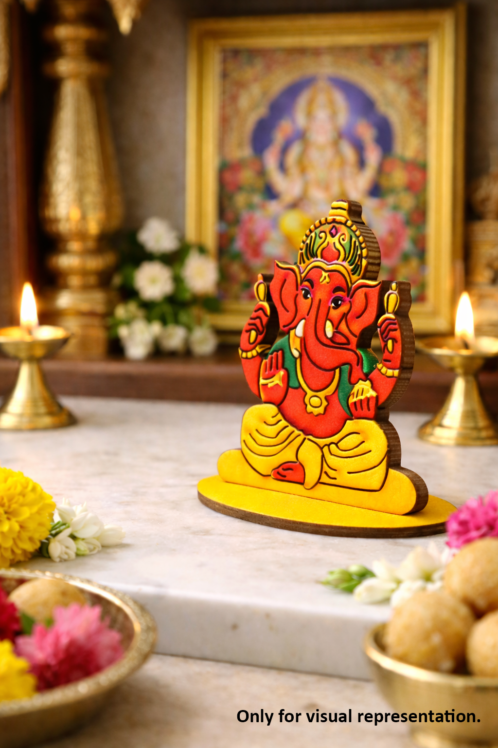 Decorative MDF DIY ganesh cutouts  on a table with flowers and candles in the background