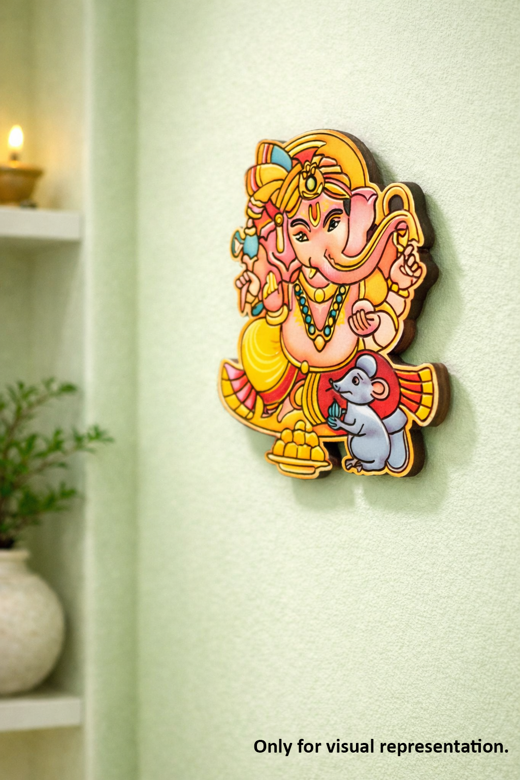 Colorful MDF DIY wall decor of a deity with a mouse on a light green wall.