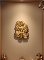 Decorative MDF DIY wall art of a deity on a beige wall