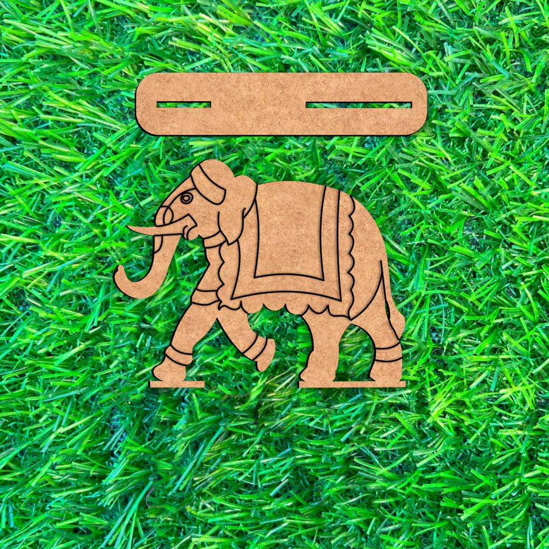 DIY MDF  elephant toy on a grassy background