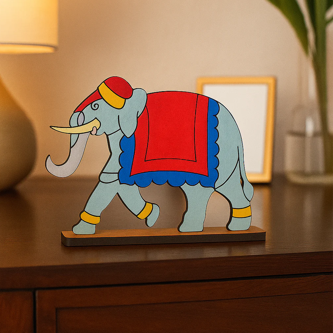 Colorful mdf elephant figurine on a wooden surface with a blurred background