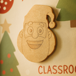 DIY MDF Santa Claus face cutout with engraved outline details and Christmas hat, unpainted brown MDF craft base mount on wall