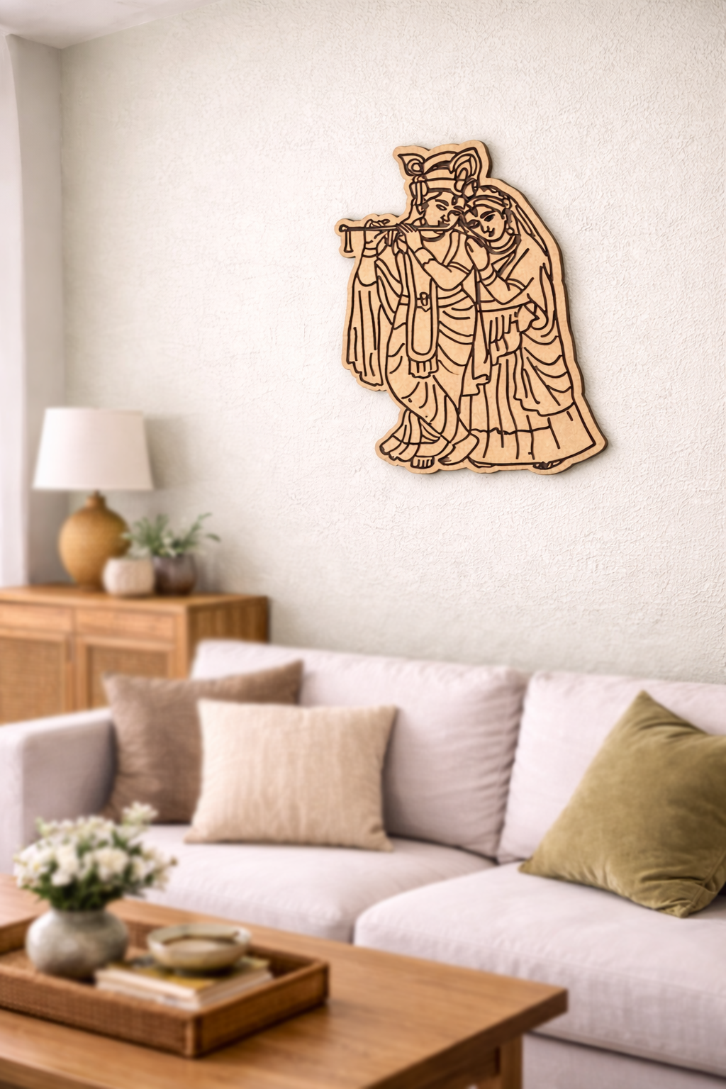 MDF DIY  wall art of a deity in a living room setting with a sofa and coffee table.