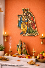 Decorative MDF DIY wall art of two figures on an orange wall with candles and fruits.