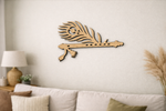  MDF DIY  wall art piece resembling a peacock feather on a wall above a sofa.