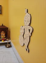 MDF DIY wall decor of a deity on a yellow wall background.