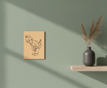 MDF DIY wall art  with a drawing of a child on a green wall with a vase and dried plants.