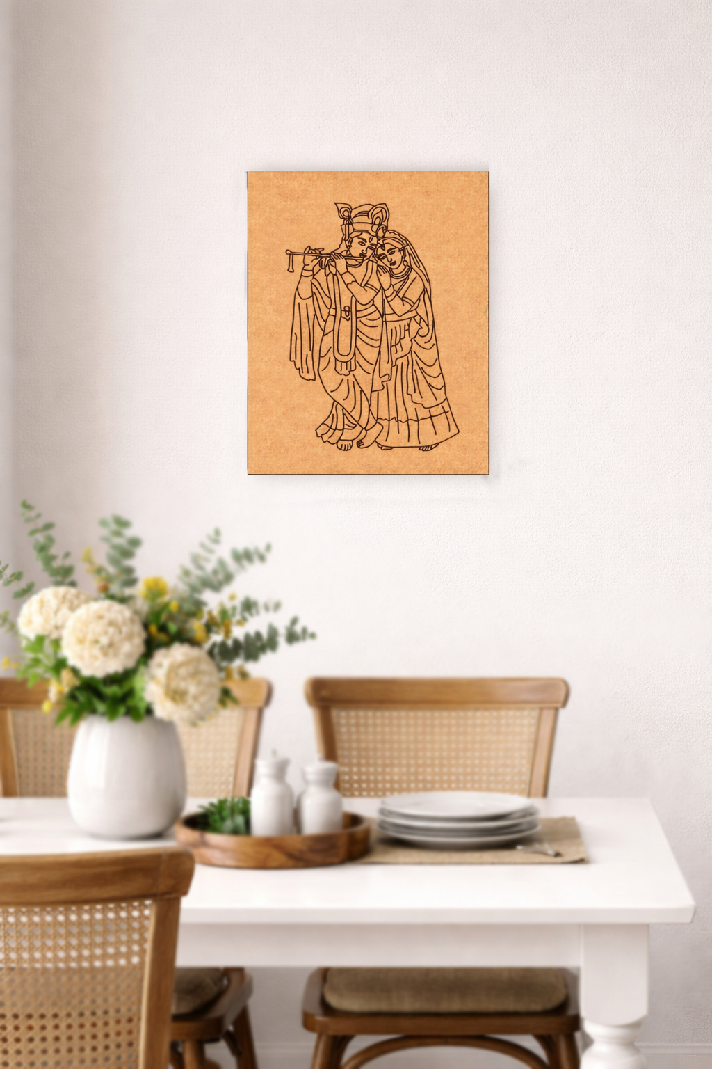 Dining room with a MDF DIY wall art of a traditional figure on the wall above a table set with plates and flowers.
