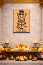MDF DIY wall art  of a deity on a marble wall above an altar with flowers and candles.