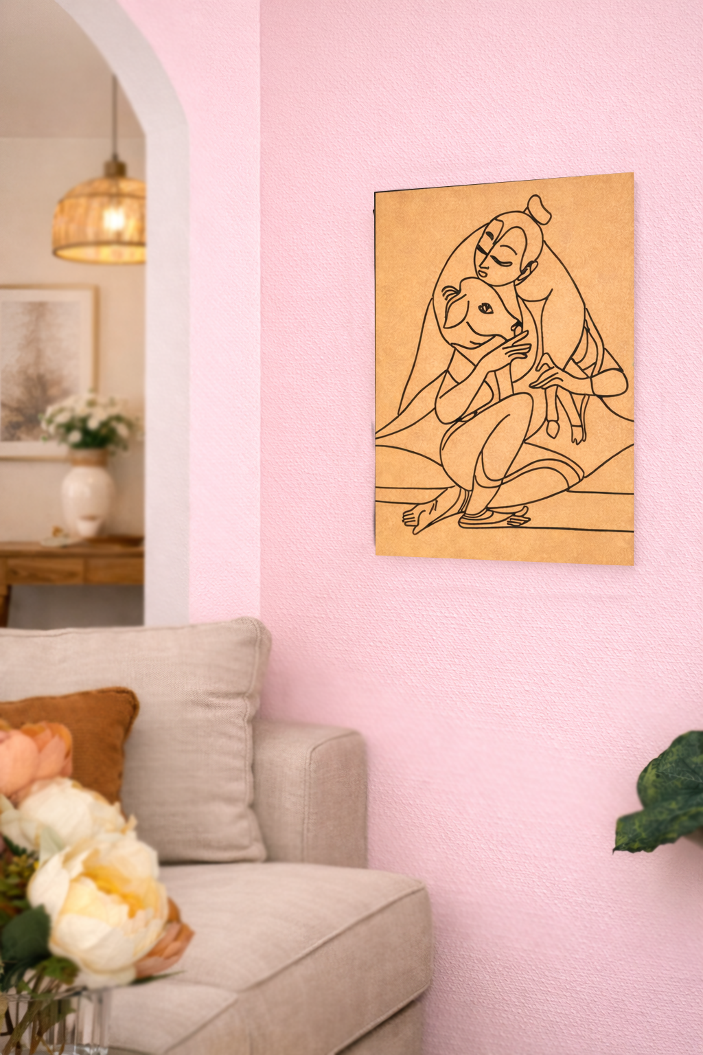 MDF DIY  wall art of a krishna and cow on a pink wall above a gray sofa.