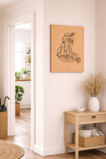 MDF DIY Canvas print of a baby krishna on a wall in a home interior with a side table and plants.