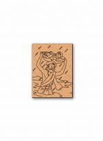 MDF DIY wall art  with a laser-cut design of a person holding a child, set against a white background.