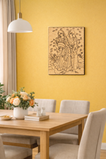 Dining room with a MDF DIY wall art piece of two people on a yellow wall.