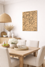 Dining room with a wooden table and chairs, decorative MDF DIY wall art, and a hanging light fixture.