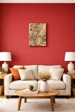 MDF DIY wall art ,Living room with red wall, beige sofa, wooden coffee table, and decorative items.