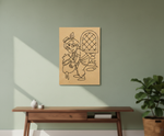 MDF DIY wall art with a cartoon character on a green wall above a wooden table.