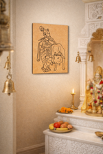 Decorative MDF DIY wall art of a deity on a wall in a religious setting with offerings and bells.