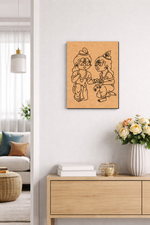 MDF DIY  wall art of two animated characters on a white wall above a wooden console table with decorative items.