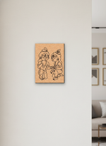 MDF DIY  wall art with two cartoon characters on a plain wall.
