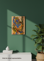 Colorful MDF DIY wall art of a deity on a green wall with a plant and decorative items.
