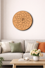 Decorative MDF DIY wall art with a floral design above a sofa in a living room